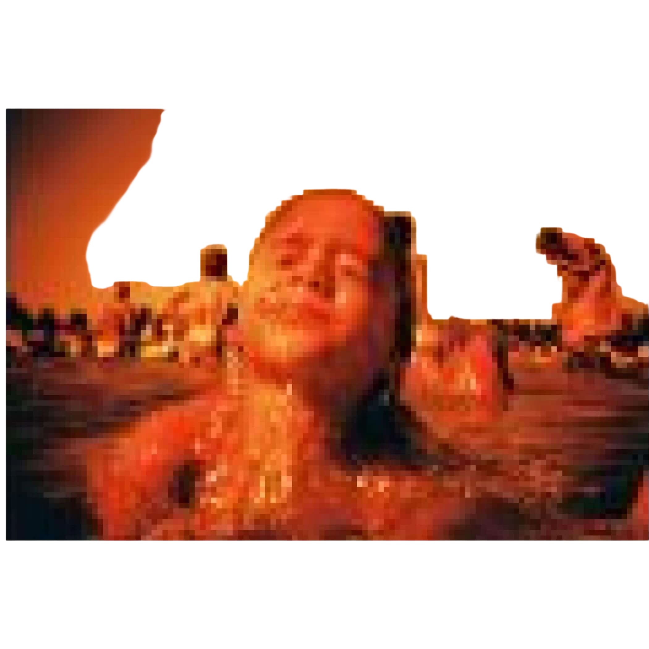 A smiling child with wet hair and a joyful expression, captured in warm orange-toned water.