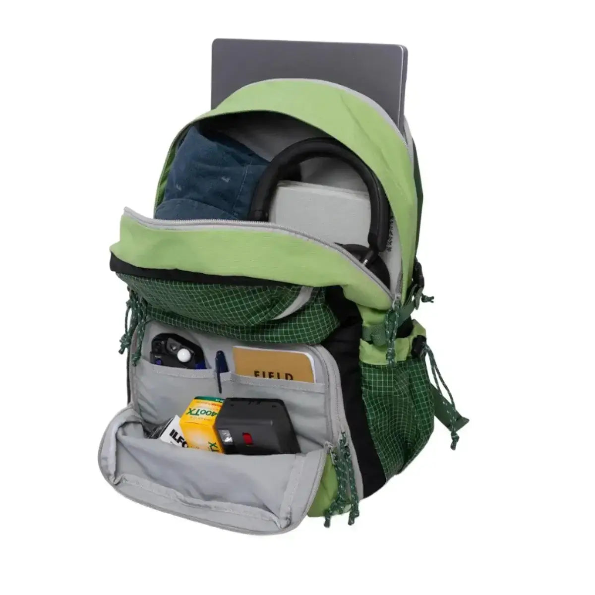 Morro Convertible Backpack in Moss color, showcasing a padded laptop pocket and organized compartments for essentials.