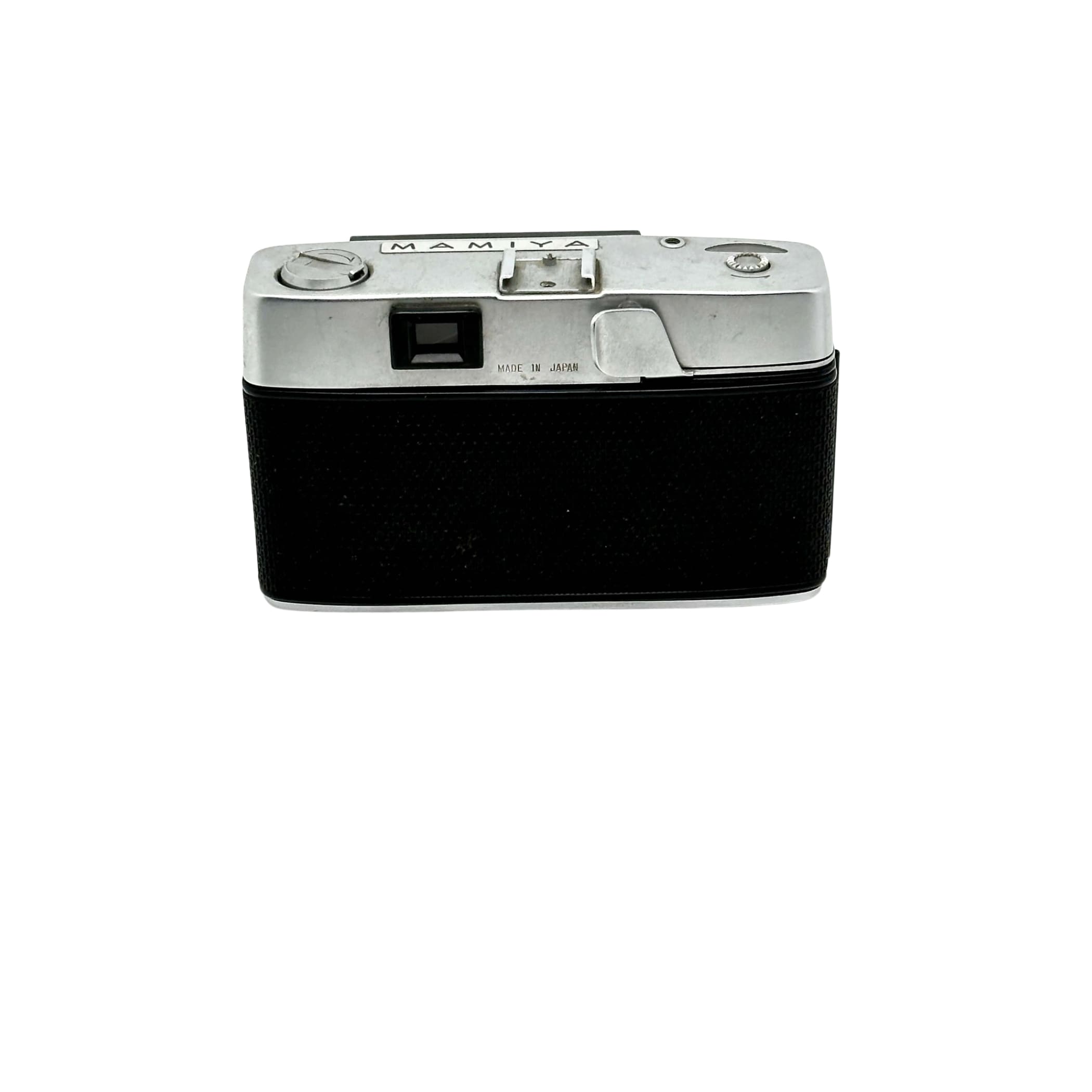 Silver-bodied mamiya film camera with a black textured leather grip.