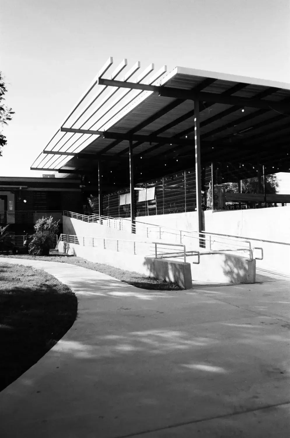 Metallic slatted awning with beams on Catlabs x film Kodak Tri-X