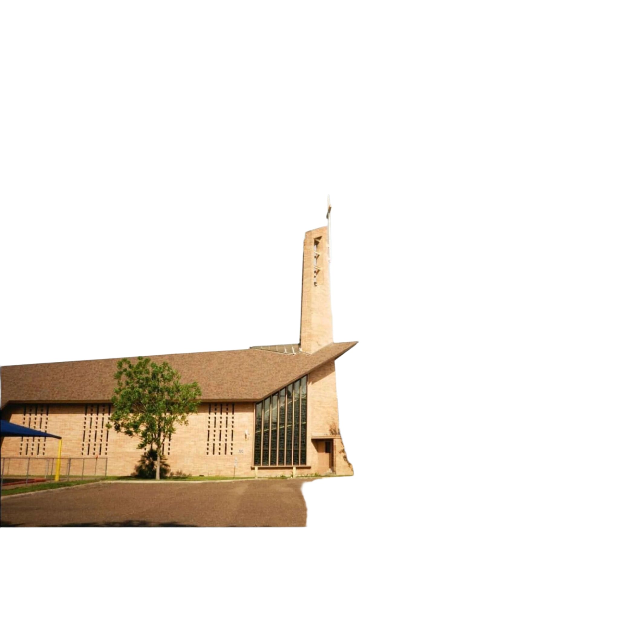 Beige stone church with a tall, slender tower topped by a cross and large glass windows.
