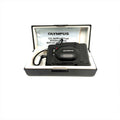Black olympus camera with a sleek, compact design and glossy finish.