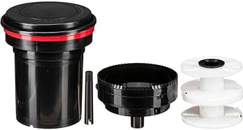 Paterson Universal Tank with two reels for film processing, compatible with 35mm and 120 film types.