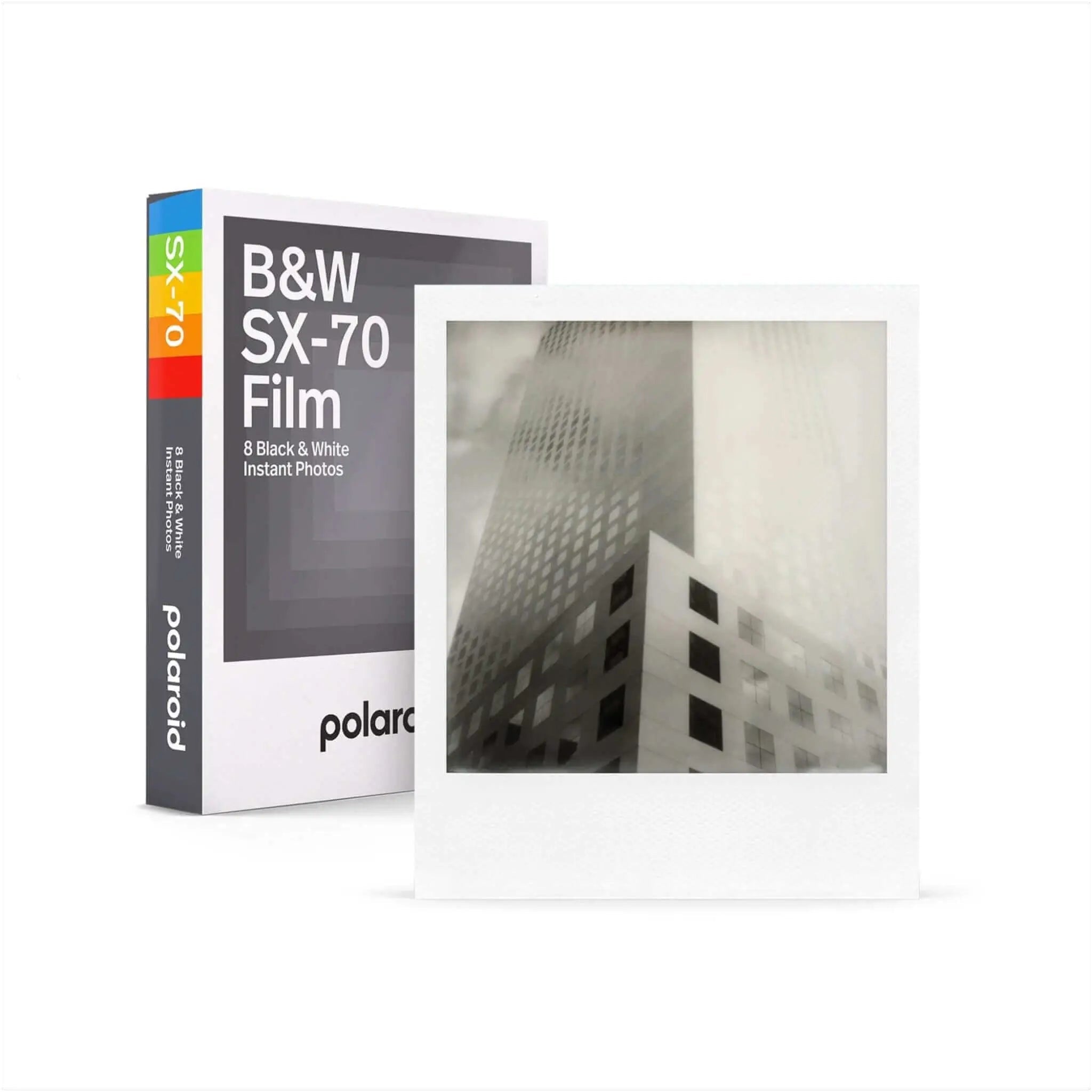Polaroid sx-70 b&w instant film pack with a white-bordered black-and-white photo of a modern building.