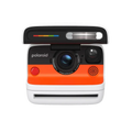 Polaroid 600 instant camera in white, black, and vibrant orange with a rainbow-colored flash indicator.