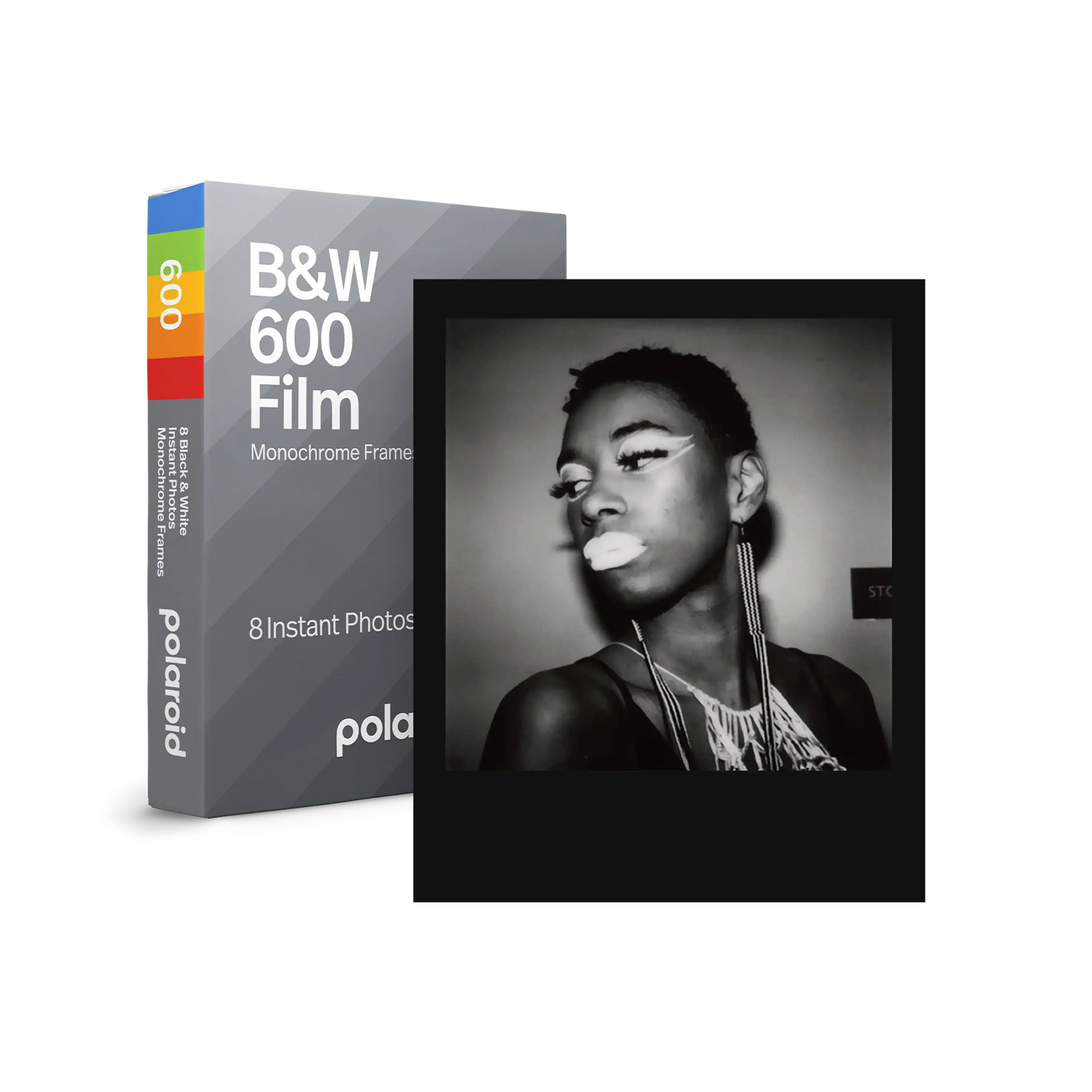 Polaroid B&W 600 film pack and monochrome instant photo of a person with dramatic makeup and earrings