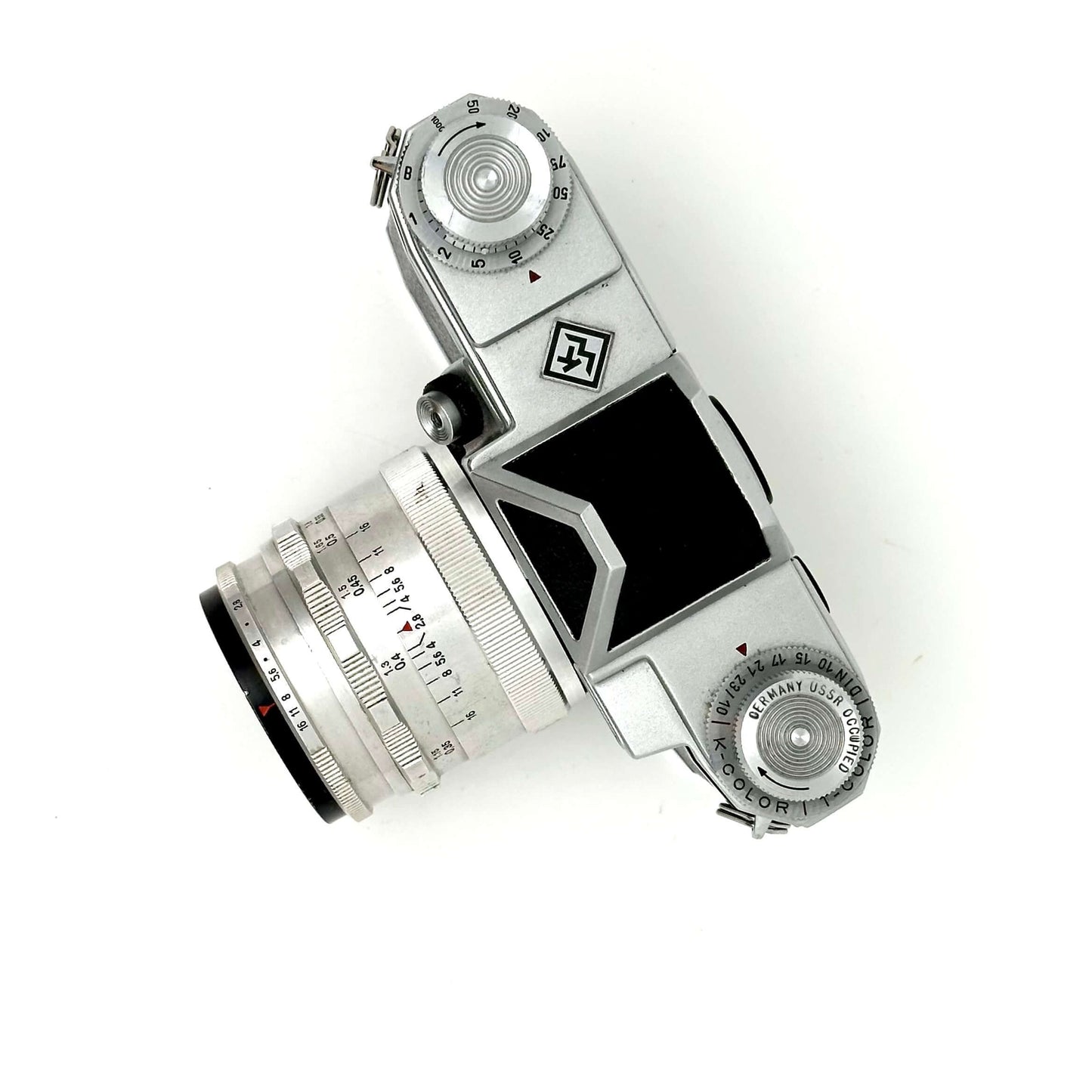 Praktina FX vintage 35mm film camera with CZJ Flektogon 35mm f2.8 lens, showing wear and tear from age.