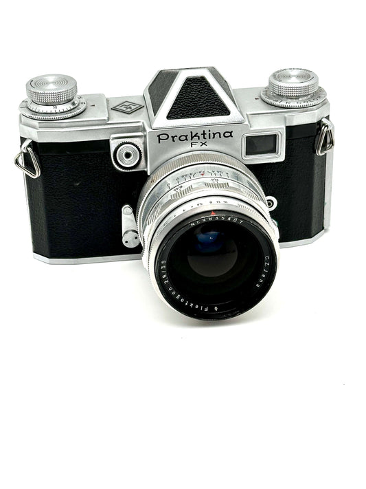Praktina FX vintage 35mm film camera with Carl Zeiss Jena Flektogon lens, showcasing classic design and functionality.