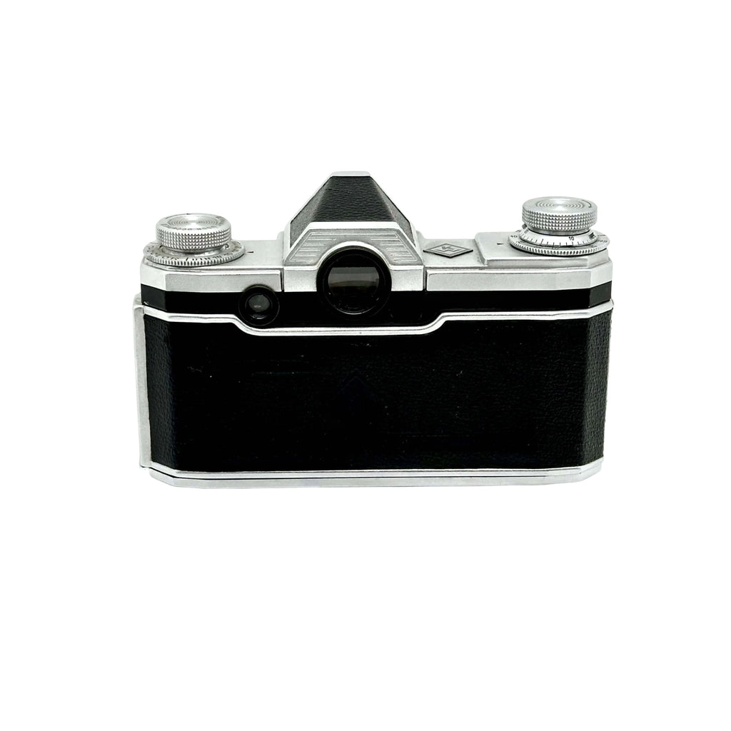 Black leather-bodied camera with silver metal accents and a classic rangefinder design.