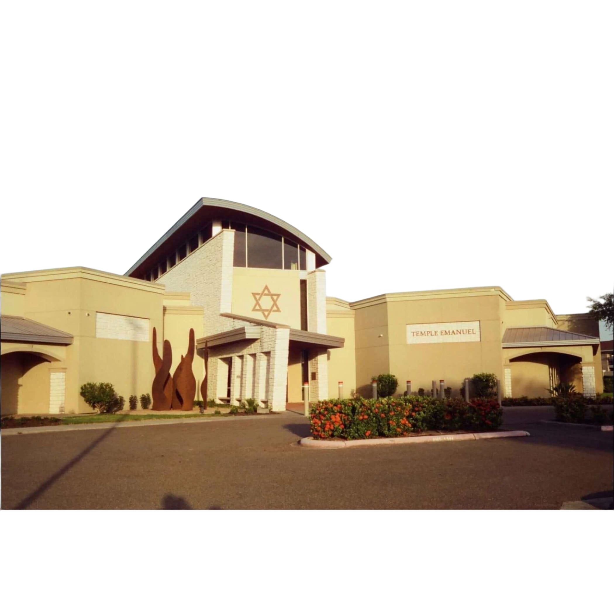 Beige stucco building with a star of david emblem and ’temple emanuel’ sign.