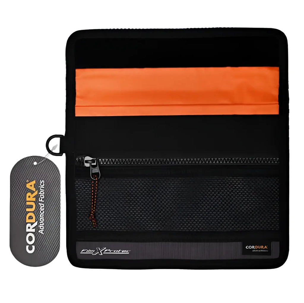 Black cordura fibrexertec wallet with an orange interior lining and a silver zipper.
