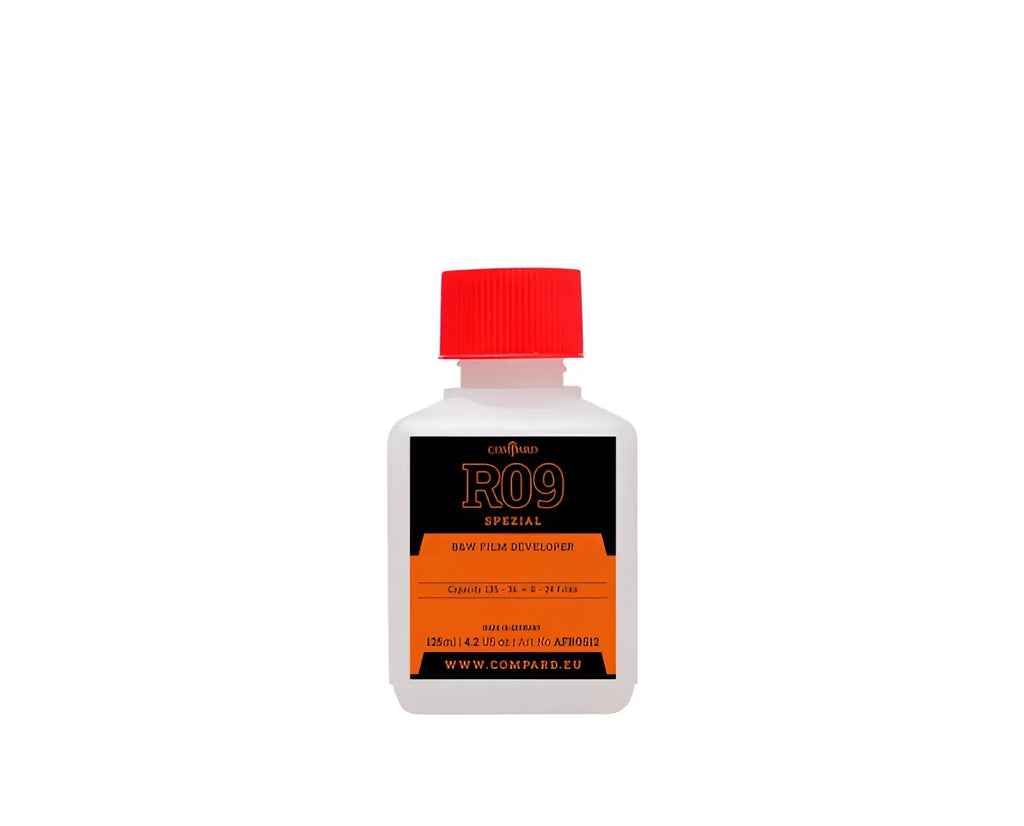 White plastic bottle with red cap and black orange label of compard r09 spezial film developer agfa rodinal special formula
