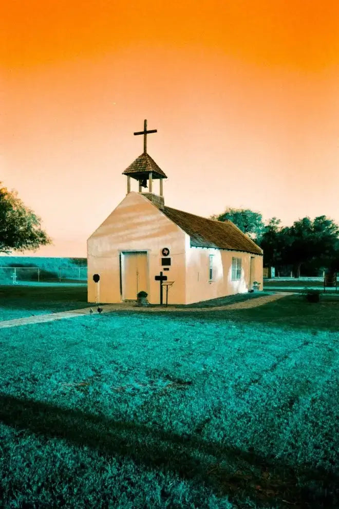 Small cream church captured on Lomography Turquoise Film