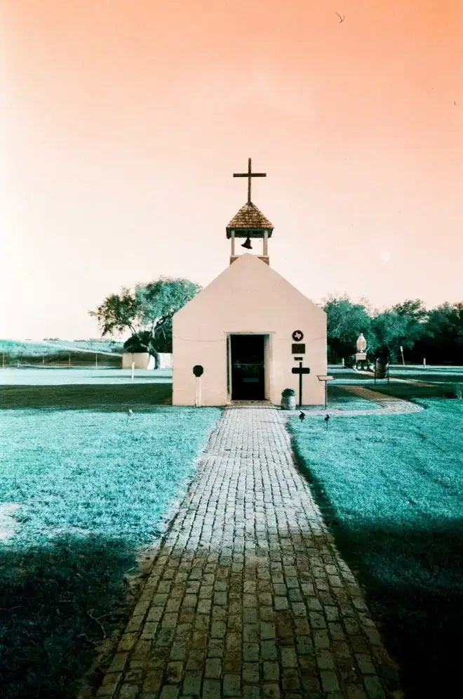 Small white chapel shot on Lomography Turquoise film
