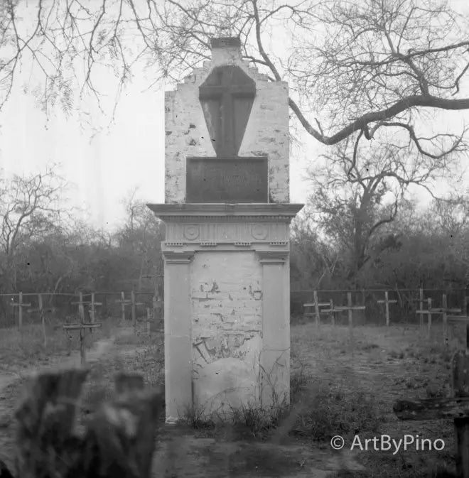 Weathered Acufine developer monument with cross in Santa Ana Cemetery, view fullsize