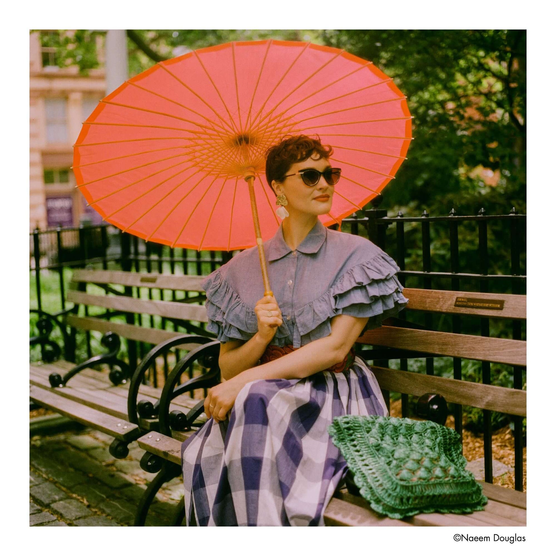 Harman Phoenix II 200 ISO Color 120 Medium Format Film photograph of woman with red parasol