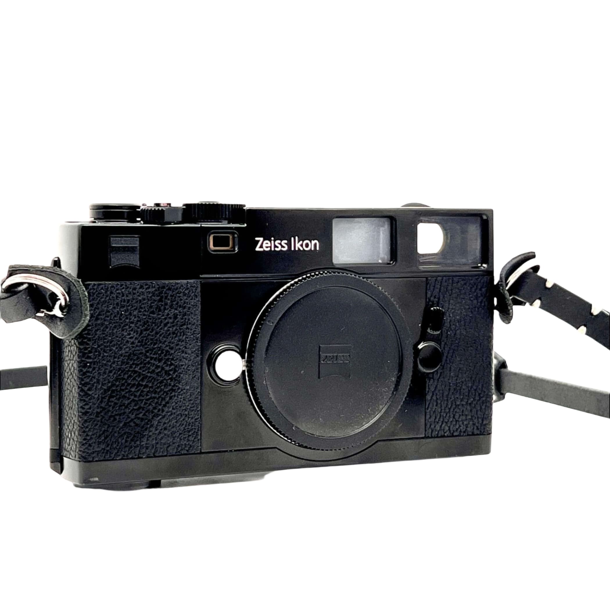 Black zeiss ikon rangefinder camera with textured leather grip and chrome accents.