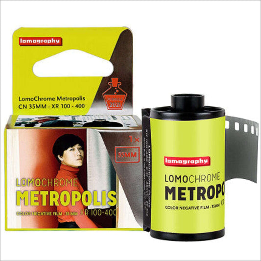 LomoChrome Metropolis 35mm film canister and packaging by Lomography for color-negative photography, ISO range 100-400.