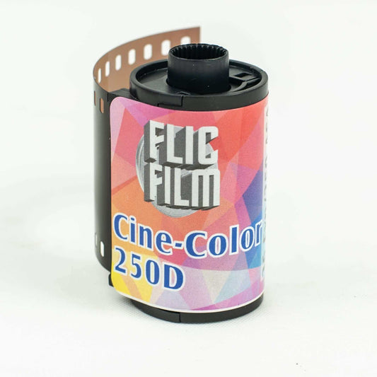 Flic Film CineColor 250D ECN-2 35mm film canister with colorful label on white background.