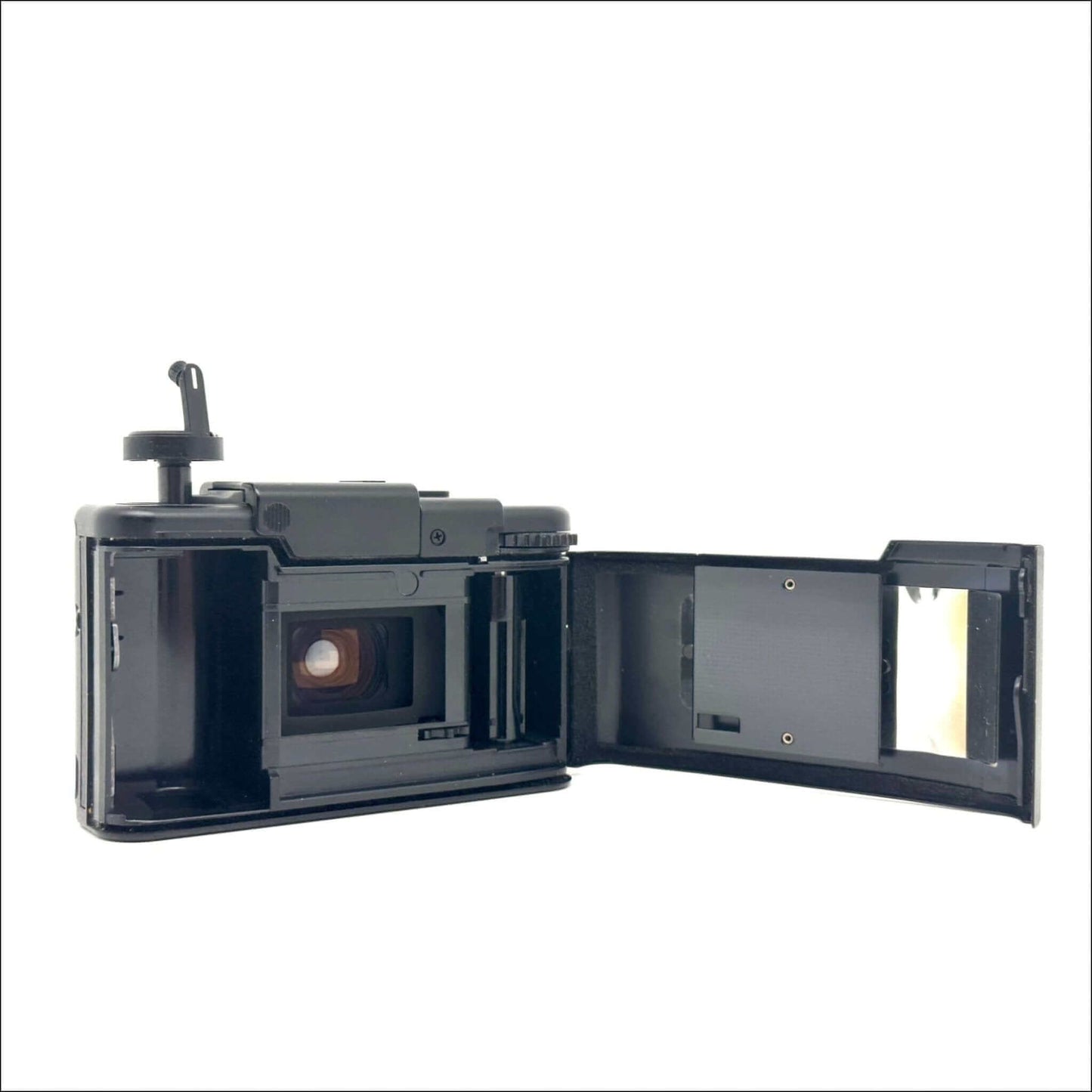 Olympus XA used 35mm vintage film camera with open back, showing inside view and mechanics, in excellent condition.