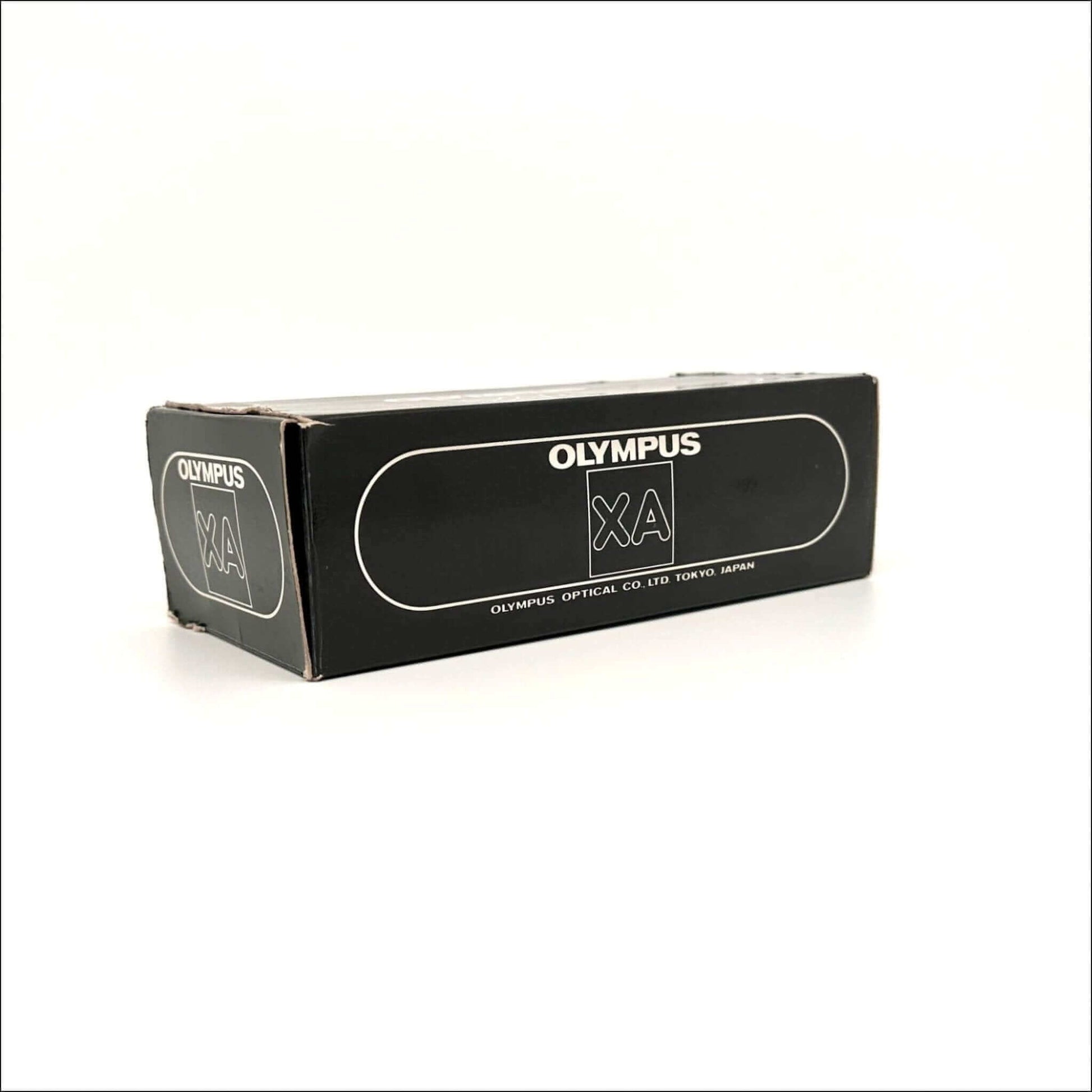 Olympus XA vintage 35mm film camera box, featuring brand logo and sleek design, ideal for collectors.