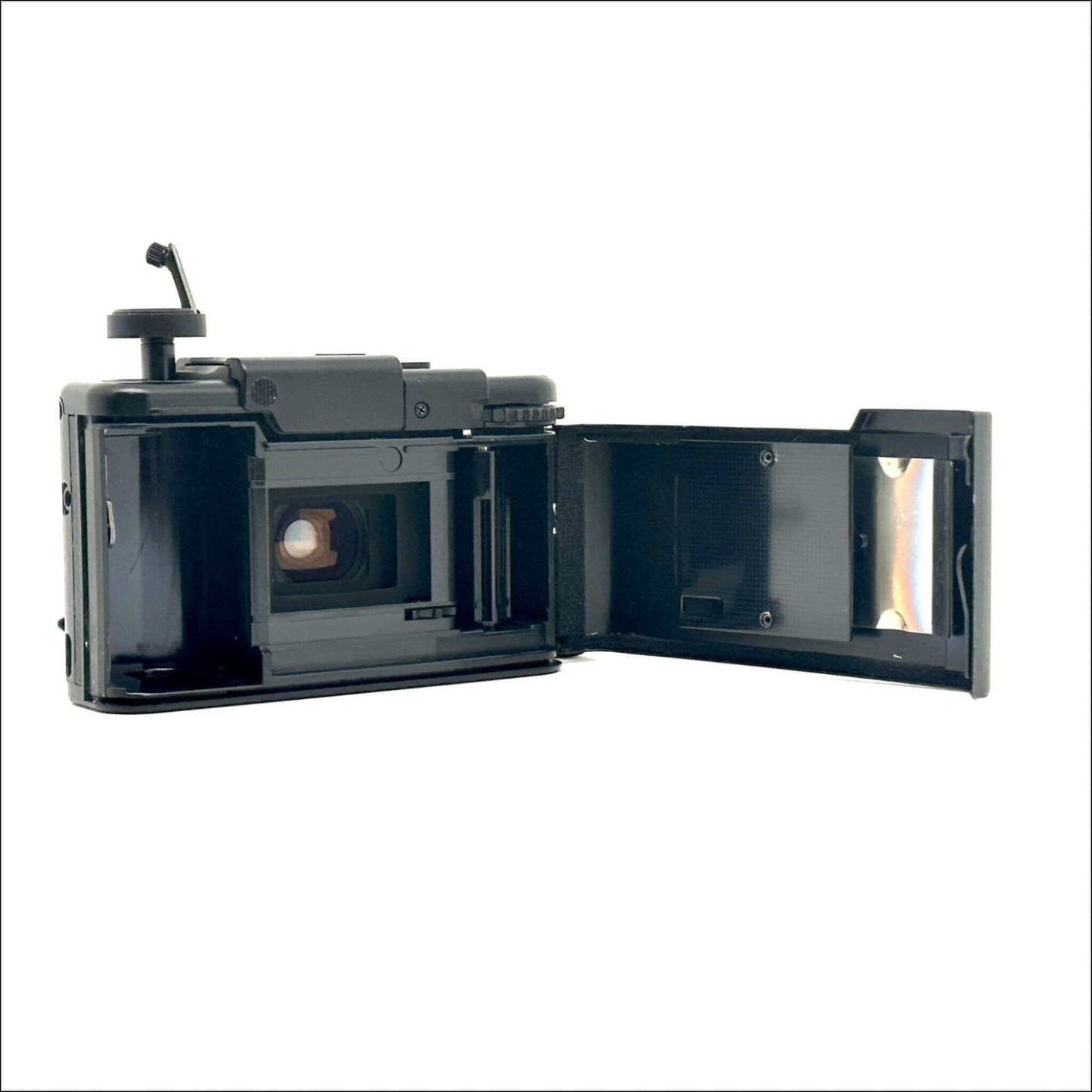 Olympus XA used 35mm vintage film camera with open film compartment and viewfinder, showcasing its fine condition.