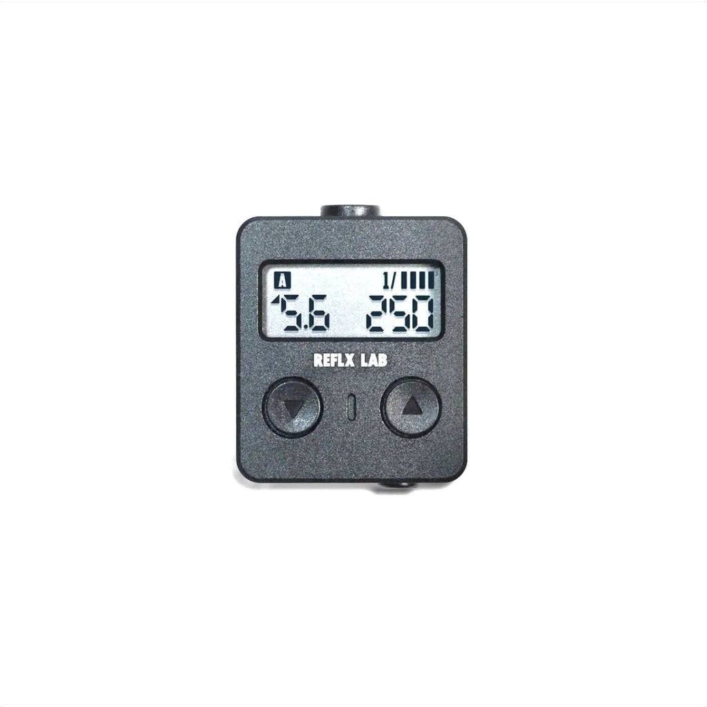Reflx Lab Digital Light Meter showing LCD display for precise exposure measurements in photography.